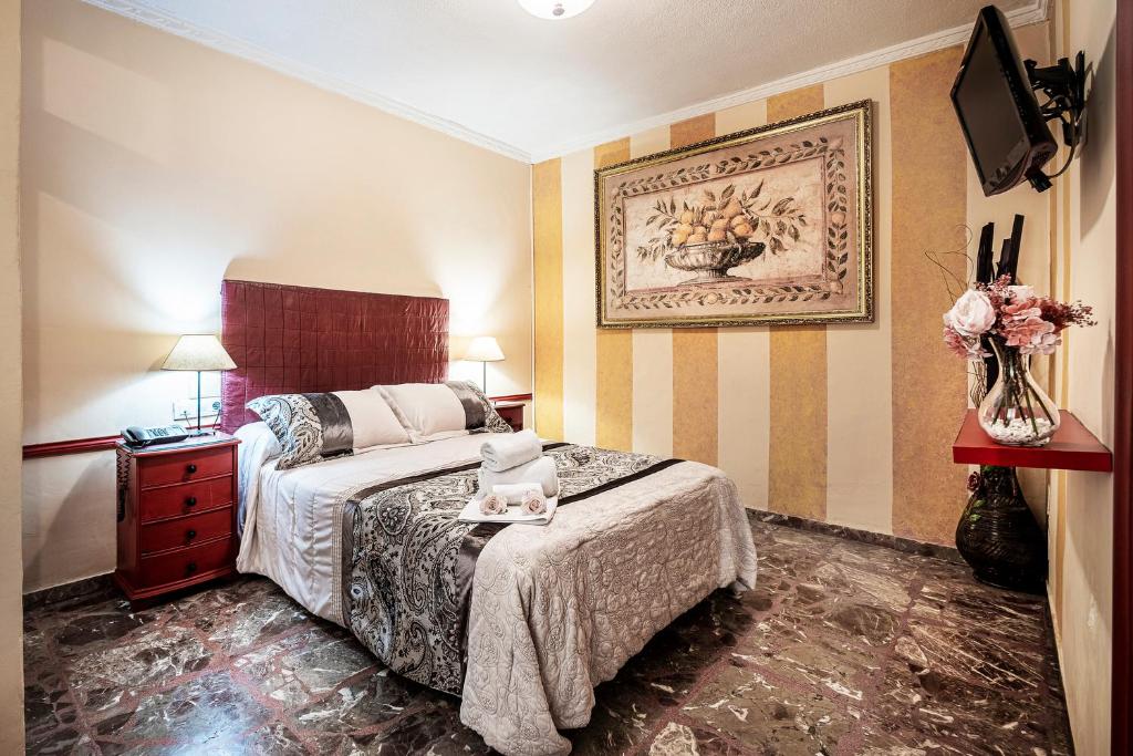 Habitación Doble Básica de Hotel Gines con cama doble